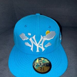 New Era Sky Blue Cap with Cloud and Sun Design size 7 3/8